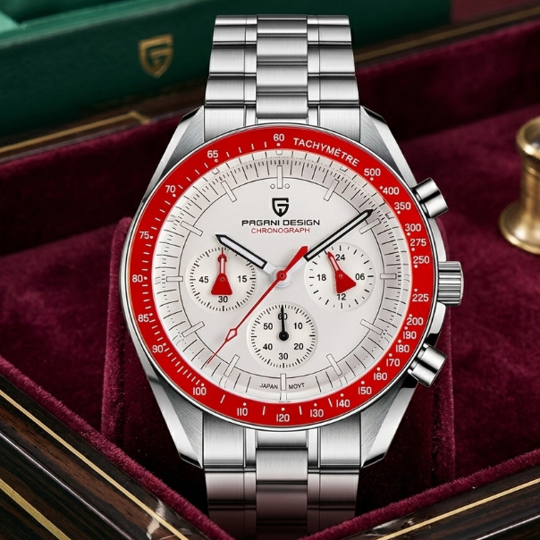 Silver and red watch with detailed face on a red cushion, brand logo visible