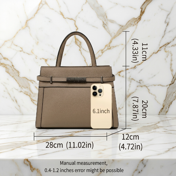 Brown handbag with measurements on a marble background