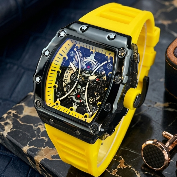 Yellow wristwatch with a detailed face on a dark marble surface