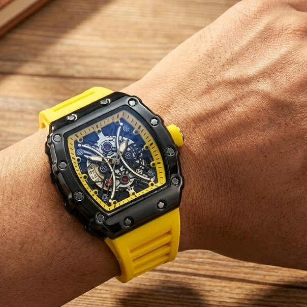 Yellow and black watch on a wrist with a wooden background