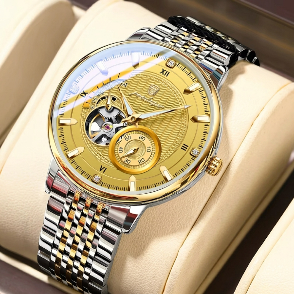 Luxury watch with gold and silver design on a beige cushion