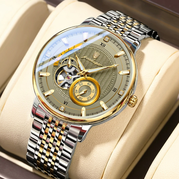 Luxury watch with silver and gold band on a beige cushion