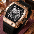 Luxury watch with rose gold case and black strap on a wooden surface